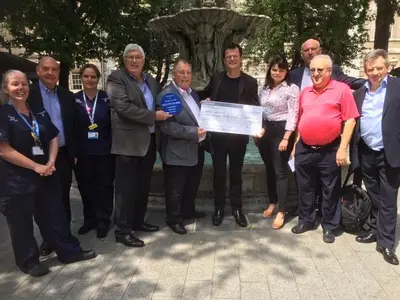 Ronaldshay Lodge presents donation to Barts Charity